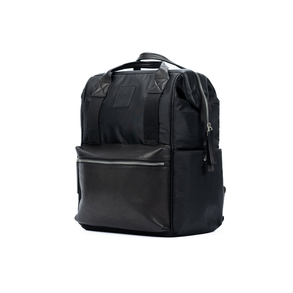 Next, open the black leather backpack and use: Black Waterproof Nylon and Full-Grain Leather Backpack