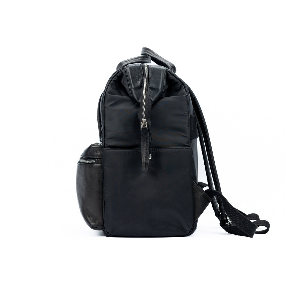 Next, open the black leather backpack and use: Black Waterproof Nylon and Full-Grain Leather Backpack